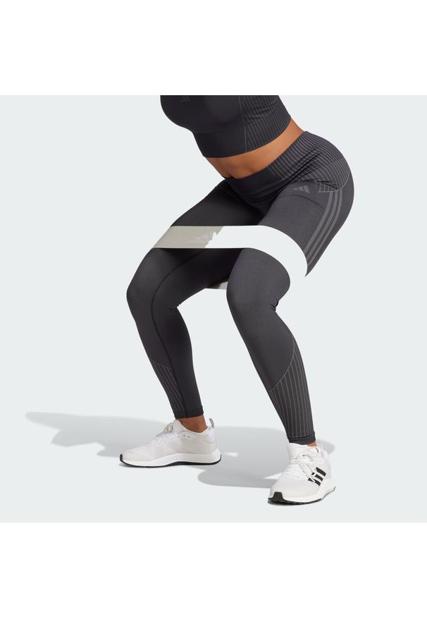 Adidas - Legginsy Seamless Branded 7/8. Kolor: czarny. Materiał: materiał