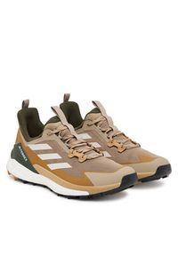 Adidas - adidas Trekkingi Terrex Free Hiker 2.0 Low JQ9904 Brązowy. Kolor: brązowy. Materiał: materiał. Model: Adidas Terrex. Sport: turystyka piesza