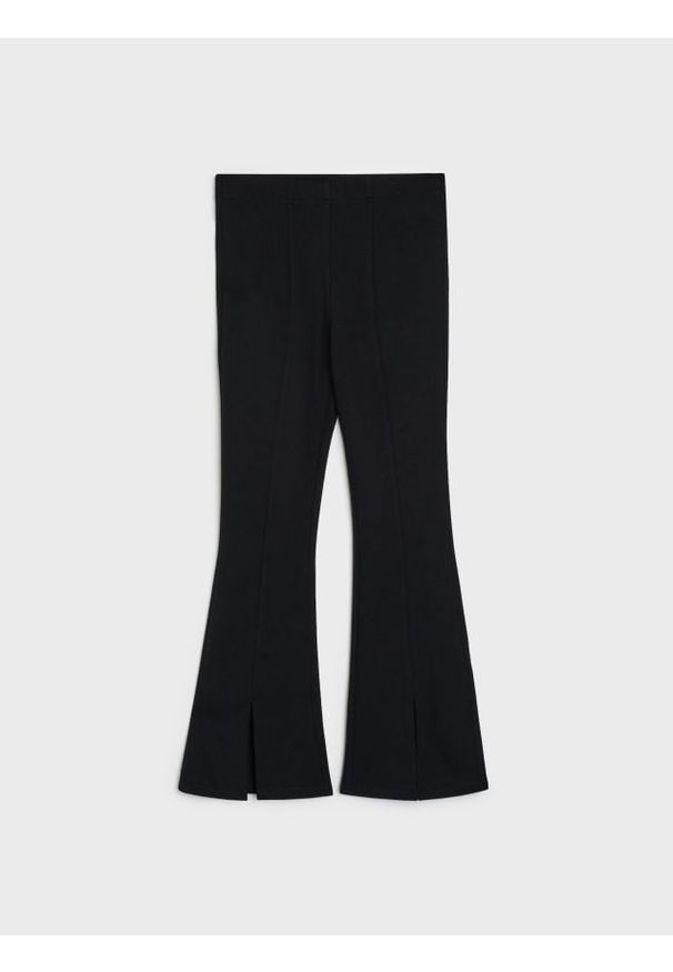 Sinsay - Legginsy flare z wiskozą - czarny. Kolor: czarny. Materiał: wiskoza