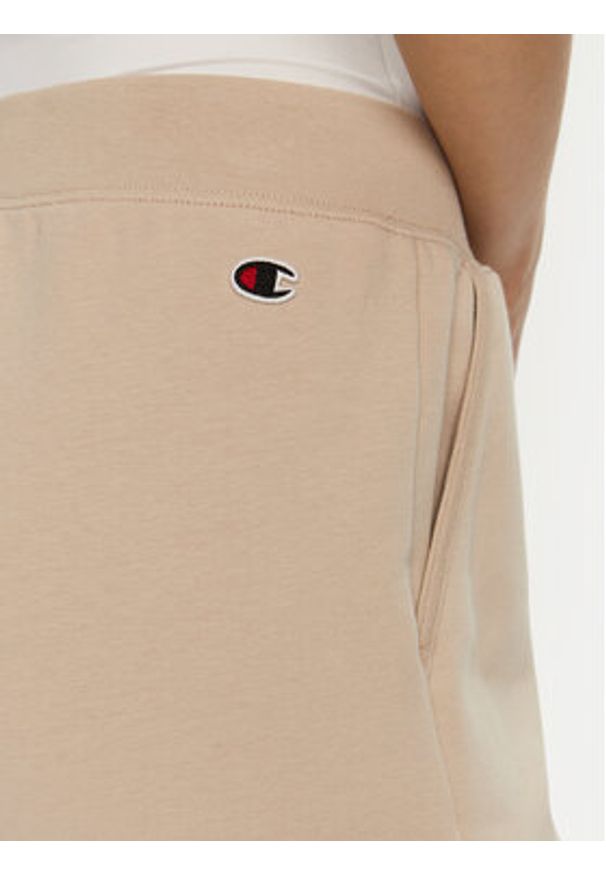 Champion Spodnie dresowe 117584 Beżowy Slim Fit. Kolor: beżowy. Materiał: bawełna