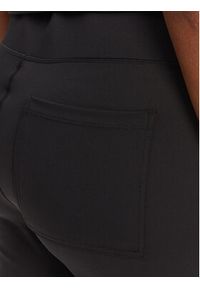 Juicy Couture Spodnie dresowe Active JCSML125403 Czarny Flared Leg. Kolor: czarny. Materiał: syntetyk