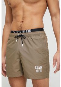 Calvin Klein szorty kąpielowe kolor brązowy. Kolor: brązowy. Materiał: tkanina, poliester, materiał. Wzór: nadruk #1