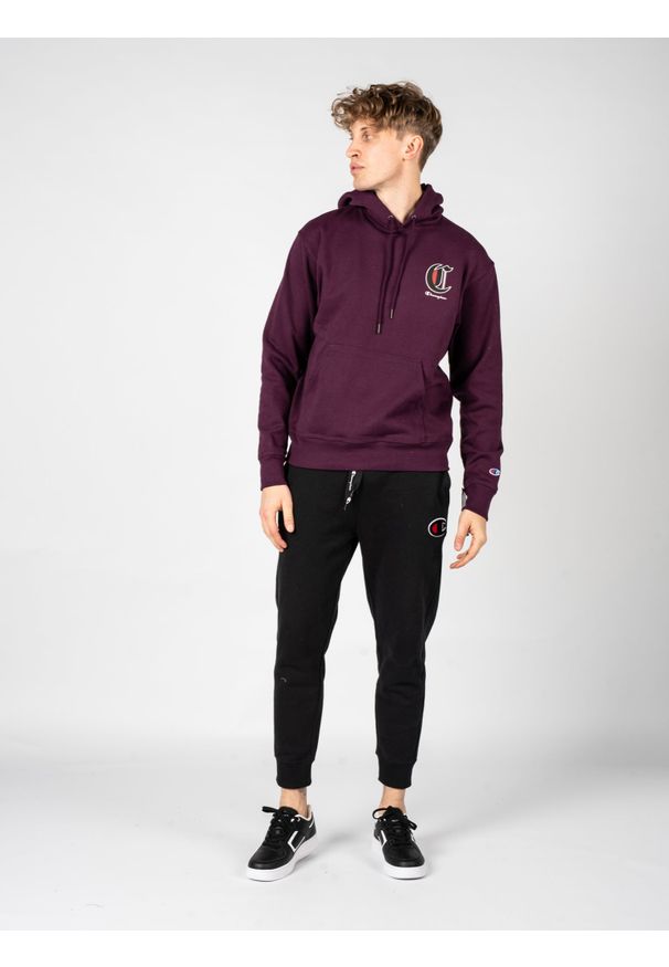 Champion Bluza "Hoodie" | HBGF89H586NKA | Mężczyzna | Fioletowy. Okazja: na co dzień. Typ kołnierza: kaptur. Kolor: fioletowy. Materiał: bawełna, poliester. Wzór: aplikacja, nadruk. Styl: casual