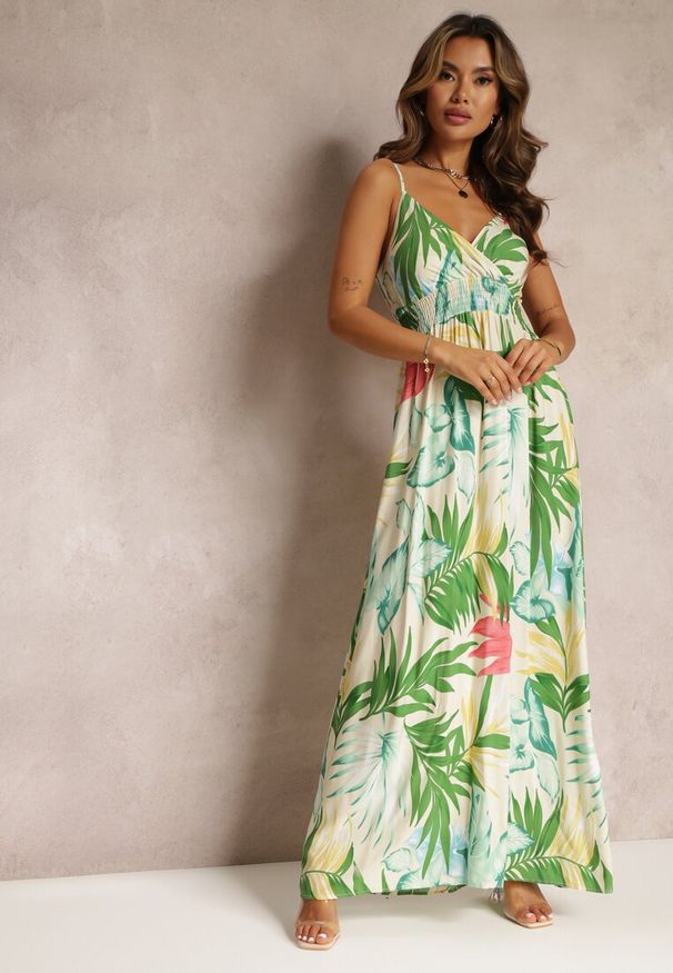 Renee - Beżowa Rozkloszowana Sukienka Maxi w Kwiaty Vadin. Typ kołnierza: dekolt kopertowy. Kolor: beżowy. Materiał: bawełna, tkanina. Długość rękawa: na ramiączkach. Wzór: kwiaty. Typ sukienki: kopertowe. Długość: maxi
