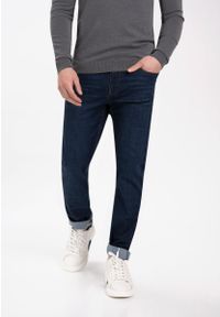 Volcano - Męskie spodnie jeansowe o prostej nogawce D-LEON 44. Okazja: do pracy, na spotkanie biznesowe. Kolekcja: plus size. Kolor: niebieski. Styl: klasyczny, elegancki, sportowy, biznesowy