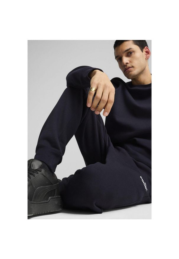 Puma - Męskie spodnie dresowe Essentials z logo No. 1 PUMA New Navy Blue. Kolor: niebieski. Materiał: dresówka