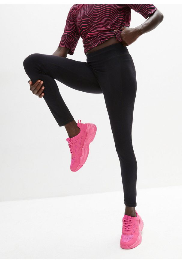 bonprix - Miękkie legginsy sportowe z kieszeniami po bokach, dł. przed kostkę. Kolor: czarny. Materiał: materiał. Styl: sportowy