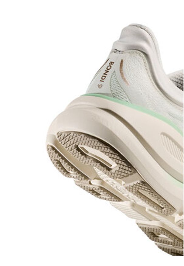HOKA - Hoka Buty do biegania Bondi 9 1162012 Beżowy. Kolor: beżowy. Materiał: materiał