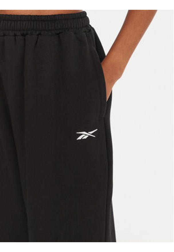 Reebok Spodnie dresowe Reebok X Ewa Chodakowska RK25306CCW Czarny Regular Fit. Kolor: czarny. Materiał: syntetyk