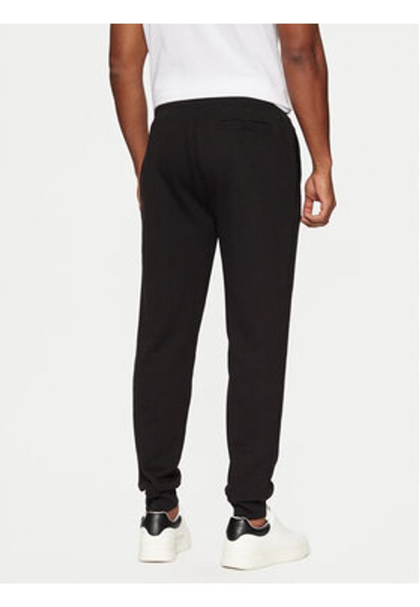 Guess Spodnie dresowe Z2YB22 KAIJ1 Czarny Regular Fit. Kolor: czarny. Materiał: bawełna