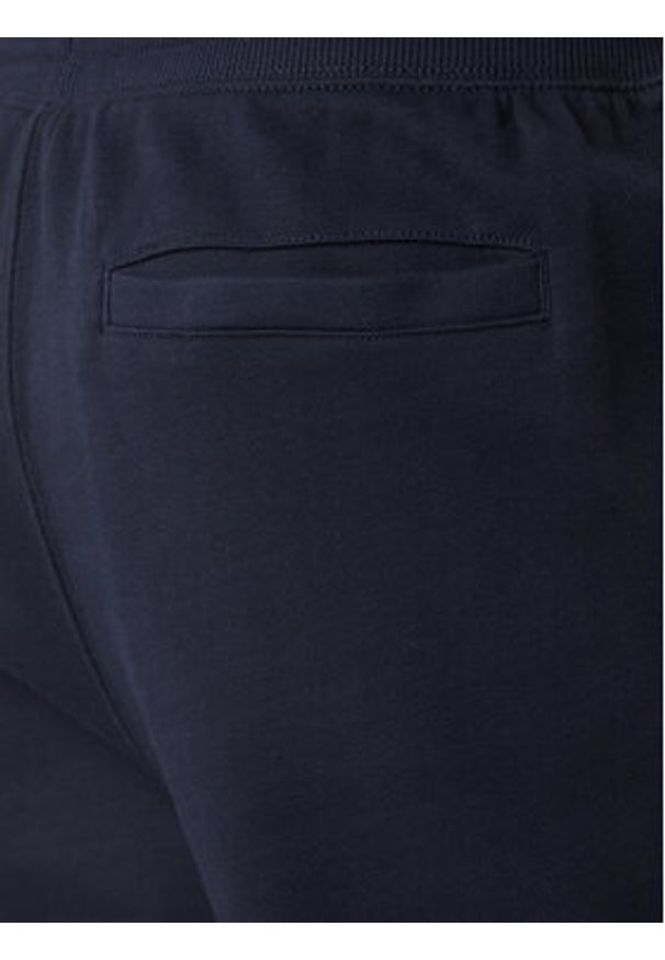 TOMMY HILFIGER - Tommy Hilfiger Spodnie dresowe Terry MW0MW37236 Granatowy Regular Fit. Kolor: niebieski. Materiał: bawełna