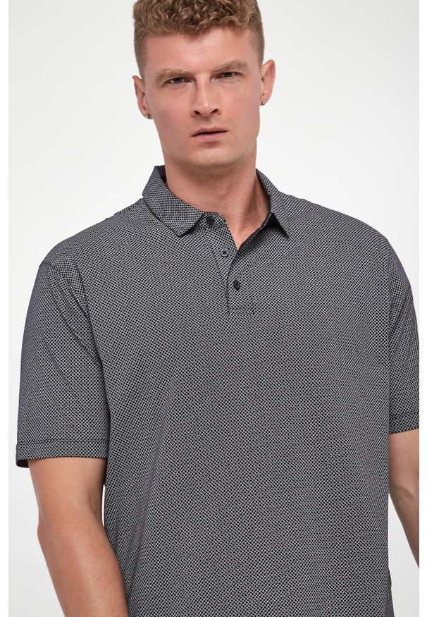 Armani Exchange - Polo męskie ze wzorem ARMANI EXCHANGE. Typ kołnierza: polo