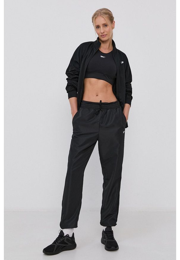 Reebok Bluza damska kolor czarny gładka. Kolor: czarny. Materiał: dzianina. Wzór: gładki