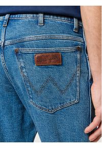 Wrangler Jeansy River 112356836 Niebieski Tapered Fit. Kolor: niebieski