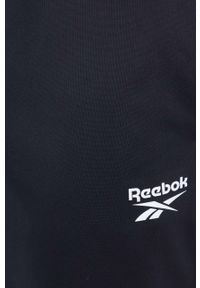 Reebok spodnie dresowe kolor czarny gładkie. Kolor: czarny. Materiał: dresówka. Wzór: gładki #3