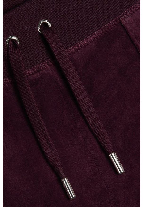 Juicy Couture - JUICY COUTURE Śliwkowe spodnie dresowe damskie Layla Low Rise, Rozmiar XS. Stan: obniżony. Kolor: fioletowy. Materiał: dresówka
