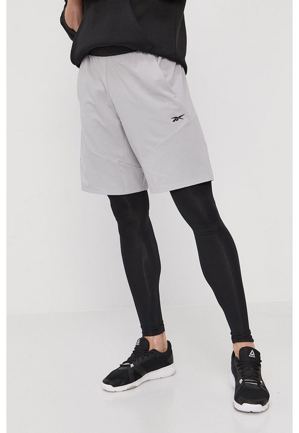 Reebok - Szorty. Okazja: na co dzień. Kolor: szary. Materiał: materiał, poliester. Styl: casual