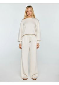 Big-Star - Spodnie damskie dresowe z szeroką nogawką kremowe Lunarap 102. Kolor: kremowy. Materiał: dresówka. Styl: elegancki #2