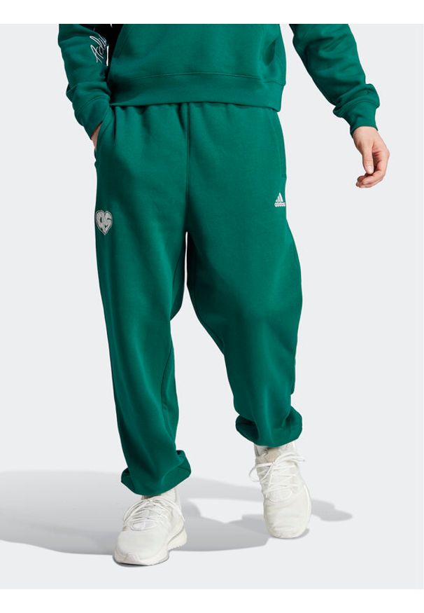 Adidas - adidas Spodnie dresowe Scribble Fleece IJ6457 Zielony Loose Fit. Kolor: zielony. Materiał: bawełna, dresówka