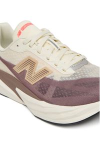 New Balance Buty do biegania FuelCell Rebel v5 WFCXLJ5 Beżowy. Kolor: beżowy. Materiał: materiał #4