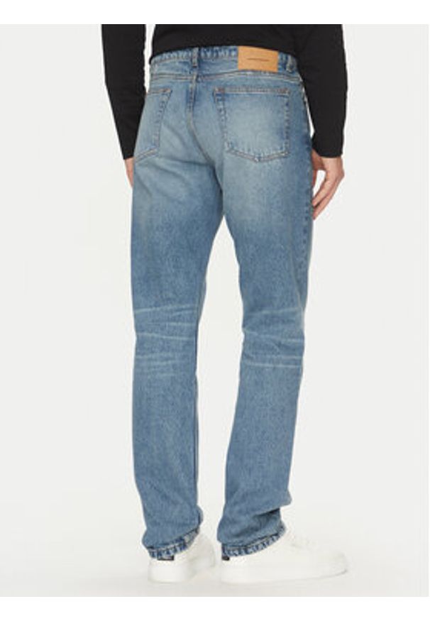 AMI PARIS - AMI Paris Jeansy HTR001.DE0046 Niebieski Classic Fit. Kolor: niebieski