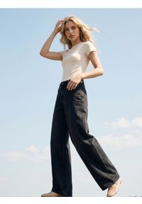 Sinsay - Jeansy wide leg z efektem sprania - czarny. Kolor: czarny