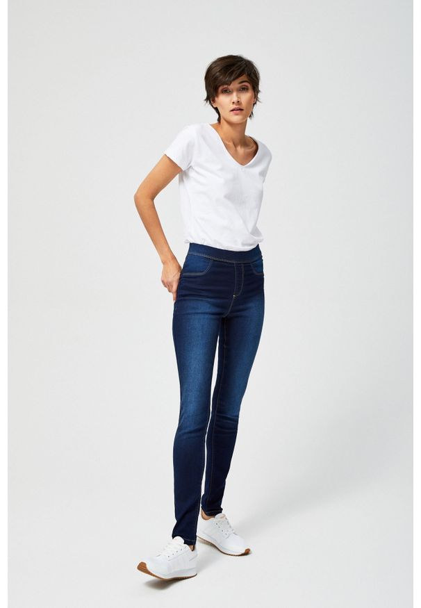 MOODO - Jegginsy w kolorze navy. Materiał: jeans, bawełna, poliester, elastan. Długość: długie. Wzór: gładki