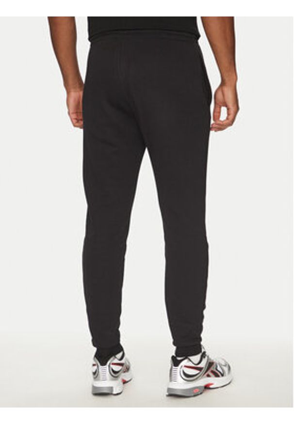 Reebok Spodnie dresowe 100221800 139-18-00 Czarny Regular Fit. Kolor: czarny. Materiał: bawełna