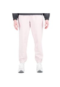 Spodnie New Balance WP31503SOI - różowe. Kolor: różowy. Materiał: dresówka, bawełna