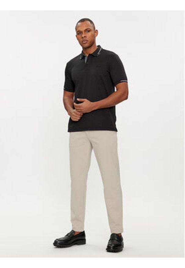 Calvin Klein Spodnie materiałowe K10K113647 Beżowy Comfort Fit. Kolor: beżowy. Materiał: syntetyk