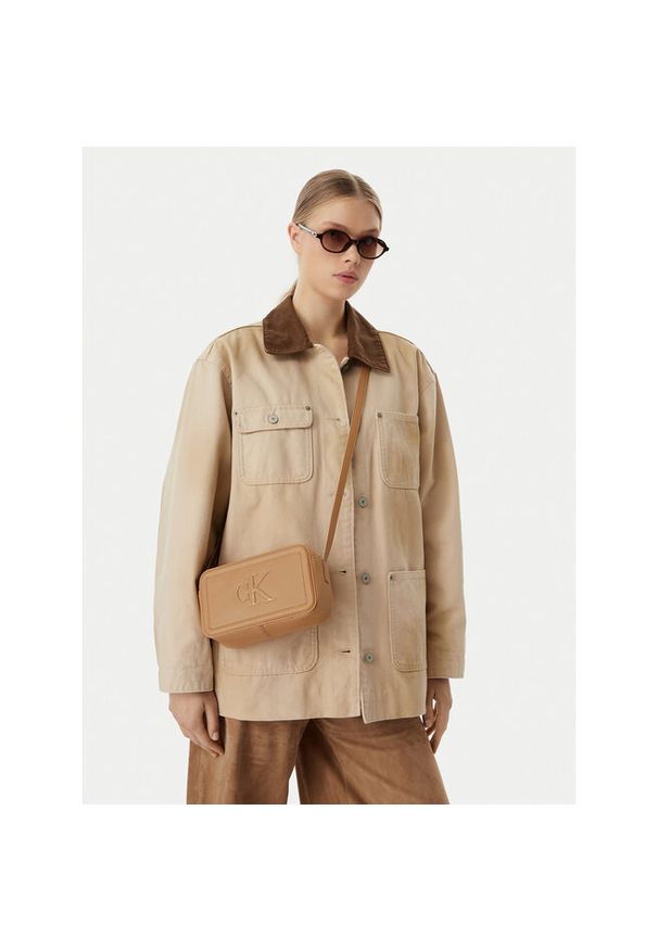Torebka Calvin Klein. Kolor: beżowy