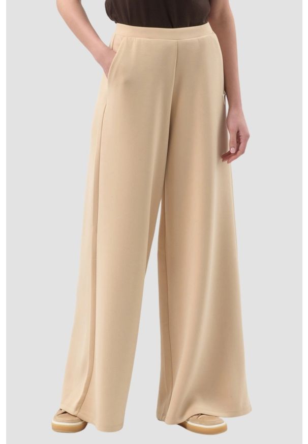 Guess - GUESS Beżowe damskie spodnie dresowe Olympe Wide Leg, Rozmiar XS. Kolor: beżowy. Materiał: dresówka