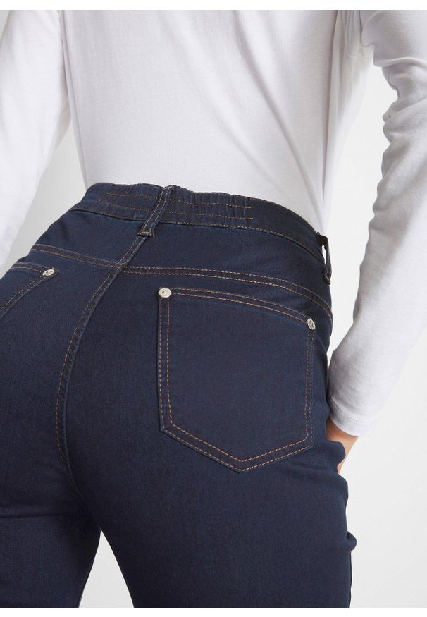 bonprix - Dżinsy Slim Fit, mid waist, z wygodnym paskiem. Kolor: niebieski