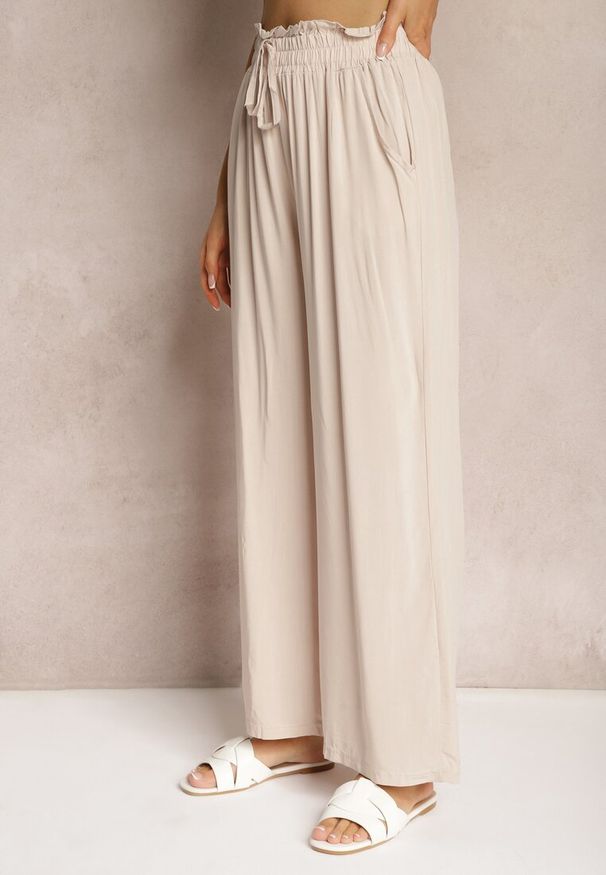 Renee - Jasnobeżowe Spodnie Palazzo High Waist z Bawełny Wykończone Gumką w Talii Nellsea. Okazja: na co dzień. Stan: podwyższony. Kolor: beżowy. Materiał: bawełna. Styl: elegancki, casual