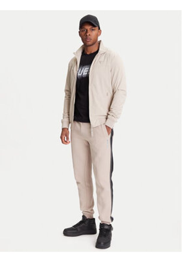 Guess Kurtka przejściowa Z5YL07 WH2H0 Beżowy Regular Fit. Kolor: beżowy. Materiał: syntetyk