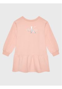 Calvin Klein Jeans Sukienka dzianinowa Gradient Monogram IG0IG01677 Różowy Relaxed Fit. Kolor: różowy. Materiał: bawełna. Wzór: gradientowy