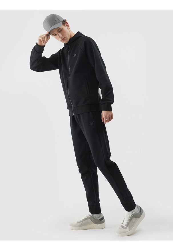 4f - Spodnie dresowe joggery męskie - czarne. Kolor: czarny. Materiał: dresówka. Wzór: ze splotem, gładki