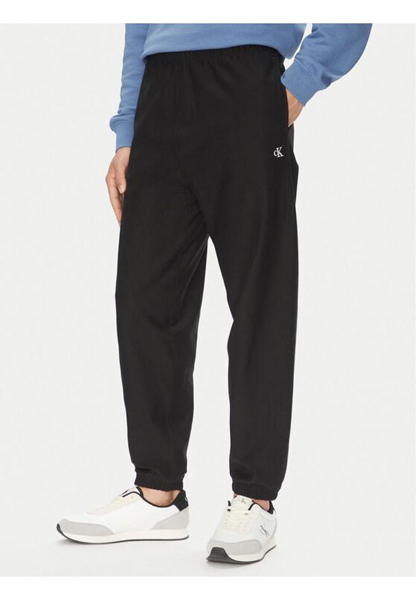 Calvin Klein Jeans Spodnie dresowe Premium LV04RC279G Czarny Regular Fit. Kolor: czarny. Materiał: bawełna