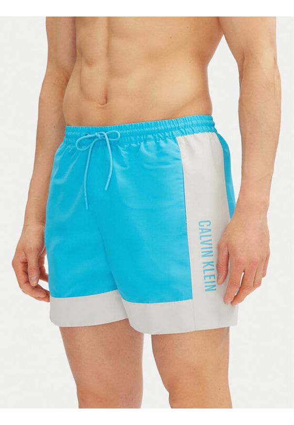 Calvin Klein Swimwear Szorty kąpielowe KM0KM01095 Niebieski Regular Fit. Kolor: niebieski. Materiał: syntetyk