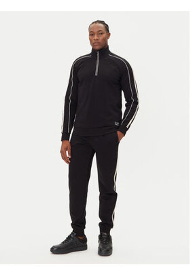 EA7 Emporio Armani Spodnie dresowe 7M000974 AF10377 UC001 Czarny Regular Fit. Kolor: czarny. Materiał: bawełna