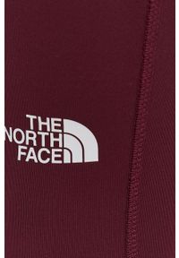The North Face - Legginsy. Kolor: czerwony. Materiał: dzianina. Wzór: gładki #3