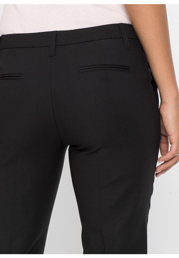 bonprix - Spodnie biznesowe 7/8. Okazja: na spotkanie biznesowe. Kolor: czarny. Styl: biznesowy