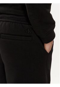 Calvin Klein Jeans Szorty sportowe Monologo J30J325131 Czarny Regular Fit. Kolor: czarny. Materiał: bawełna, syntetyk. Styl: sportowy