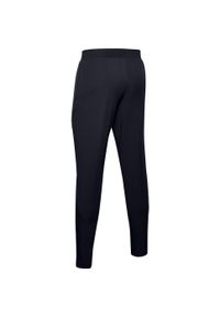 Spodnie dresowe slim fit Under Armour Flex Woven. Kolor: czarny, szary, wielokolorowy. Materiał: dresówka. Sport: fitness