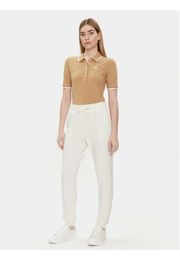 TOMMY HILFIGER - Tommy Hilfiger Spodnie dresowe UW0UW04785 Écru Regular Fit. Kolor: kremowy. Materiał: dresówka