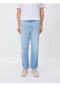 Reserved - Jeansy straight z efektem sprania - niebieski. Kolor: niebieski #1