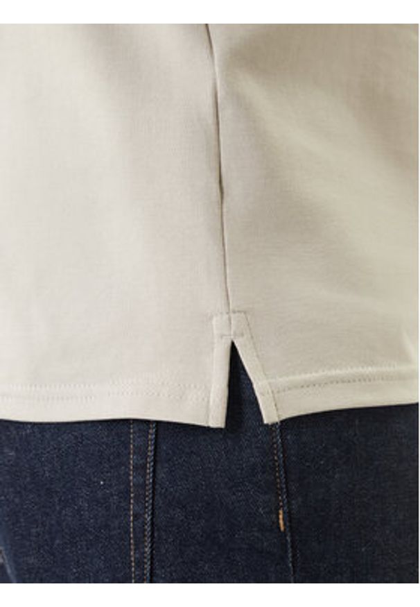 Calvin Klein Polo LV04LC254G Beżowy Slim Fit. Typ kołnierza: polo. Kolor: beżowy. Materiał: bawełna