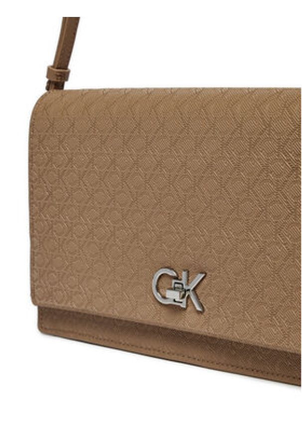 Calvin Klein Torebka Ck Elongated Shoulder Bag_Mono K60K613139 Beżowy. Kolor: beżowy. Materiał: skórzane