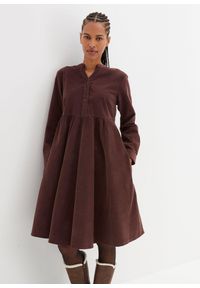 bonprix - Sukienka ze sztruksu z bawełny. Typ kołnierza: dekolt w serek. Kolor: brązowy. Materiał: bawełna, sztruks. Długość: midi #1