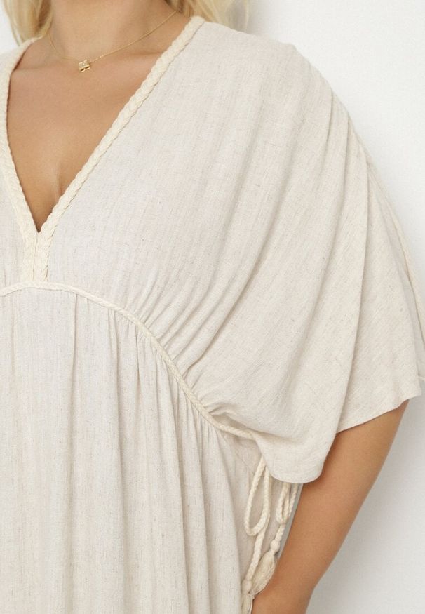 Born2be - Beżowa Wiskozowa Sukienka z Lnem o Nietoperzowym Kroju z Wiązaniem Tolureia. Okazja: na co dzień. Typ kołnierza: dekolt w serek. Kolor: beżowy. Materiał: wiskoza, len. Styl: casual, elegancki